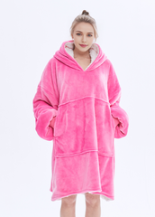 Hot pink SnuglFit™ hoodie blanket providing oversized comfort and warmth