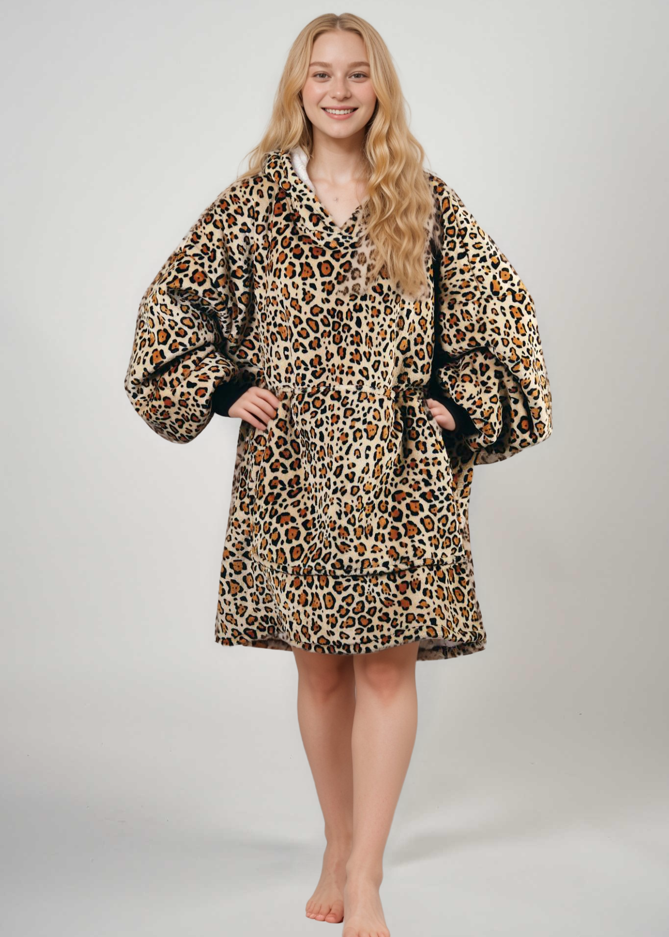 SNUGLFIT™ Hoodie Blanket in Leopard Print worn by a model, showcasing its oversized comfort and plush Sherpa fleece design.
