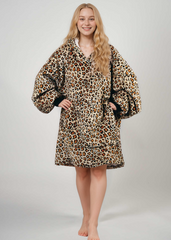 SNUGLFIT™ Hoodie Blanket in Leopard Print worn by a model, showcasing its oversized comfort and plush Sherpa fleece design.