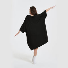 Snuglfit™ Oversized Puppy Sleep Tee in black, one size fits most, featuring a cozy and stretchy fit, made from eco-friendly bamboo fabric with heat-regulating properties.