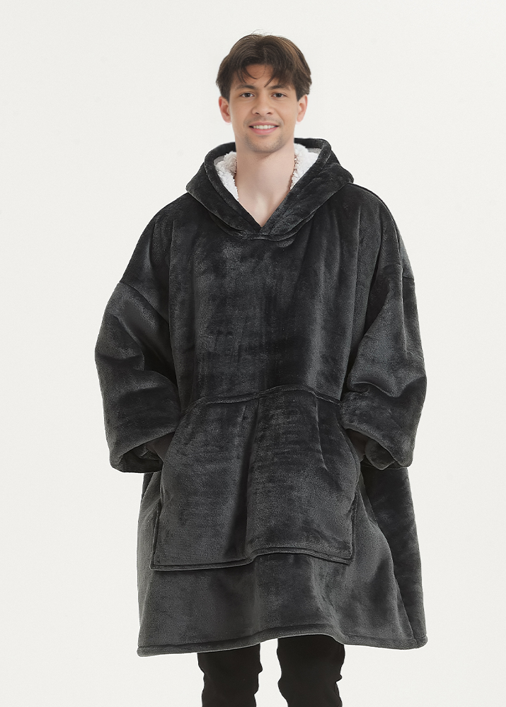SNUGLFIT™ Hoodie Blanket in Smokey Grey; oversized wearable blanket; plush Sherpa fleece interior; roomy hood and large pocket; sustainable materials.