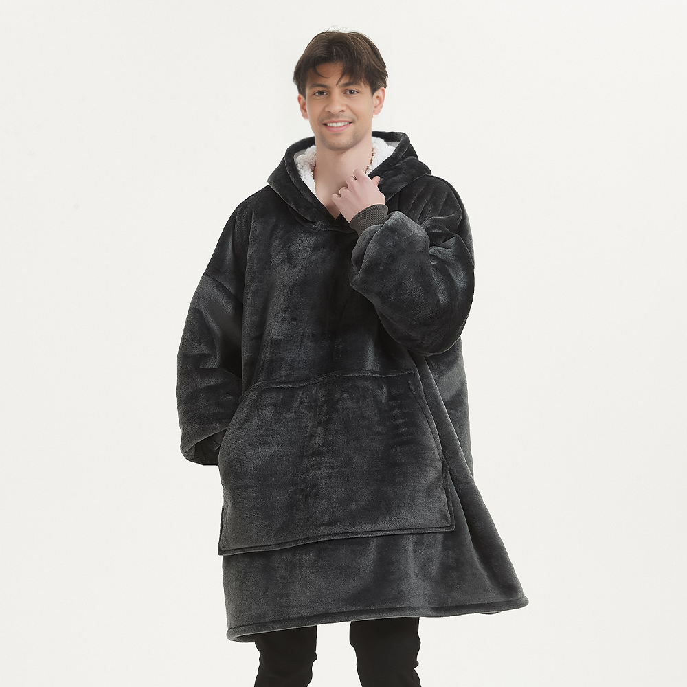 Smokey grey SnuglFit™ hoodie blanket with roomy design and plush fleece material.