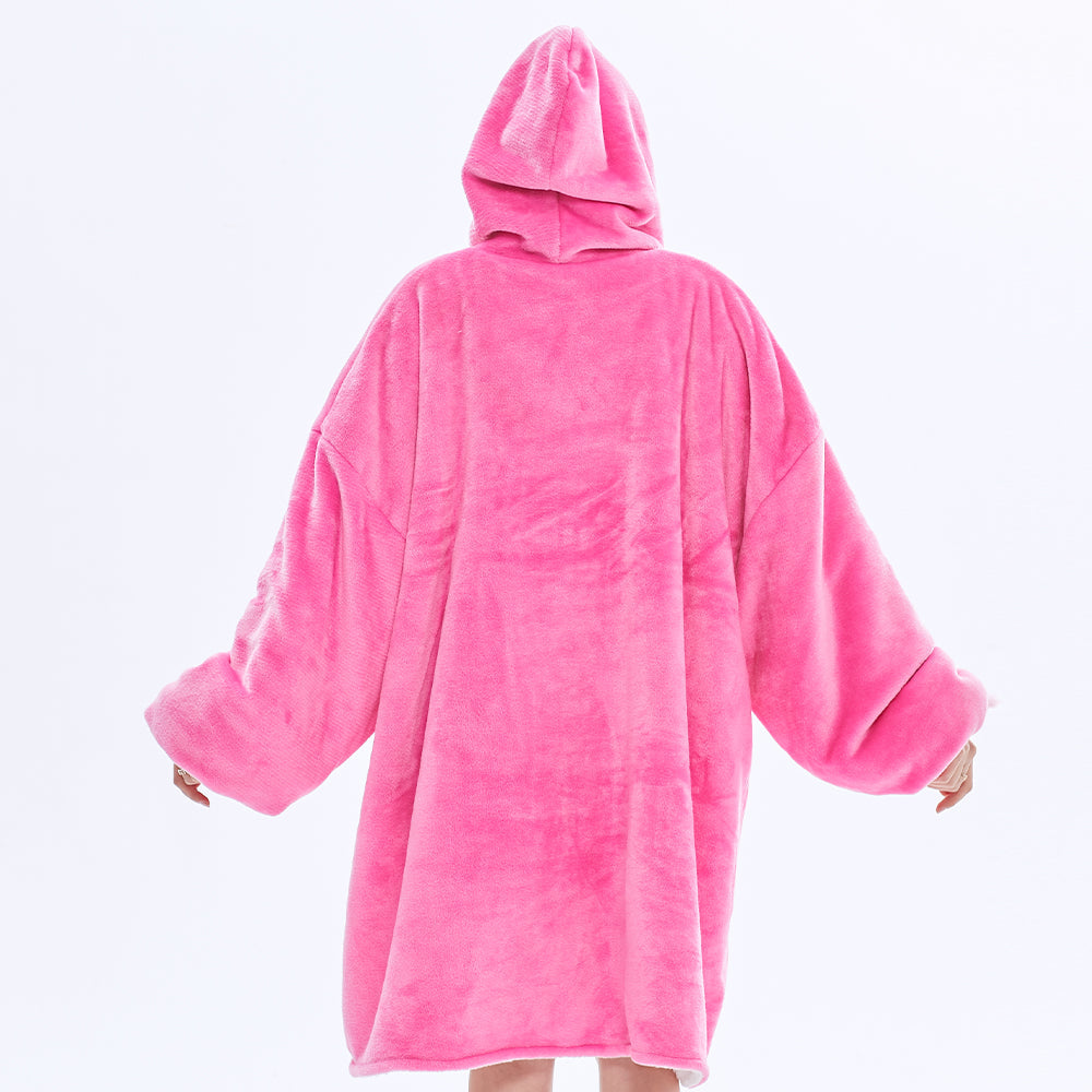 Hot pink SNUGLFIT™ Hoodie Blanket showcasing its oversized fit and plush comfort.