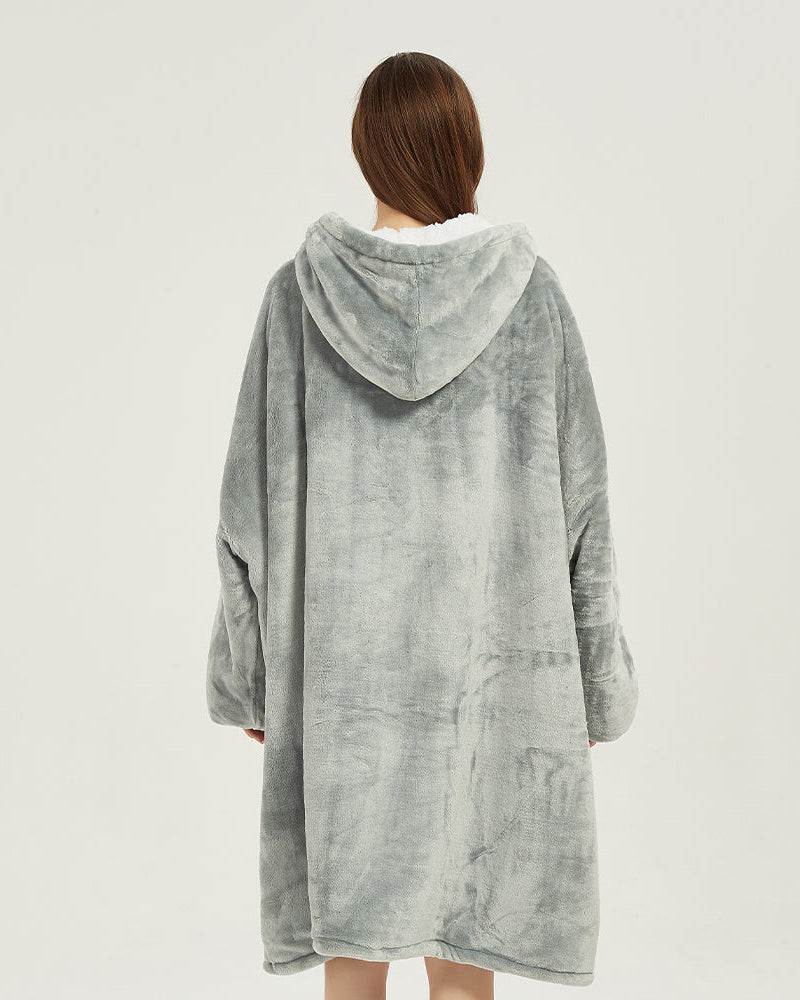 Light grey oversized SnuglFit™ hoodie blanket with plush Sherpa fleece interior, shown from the back for full-body coverage.