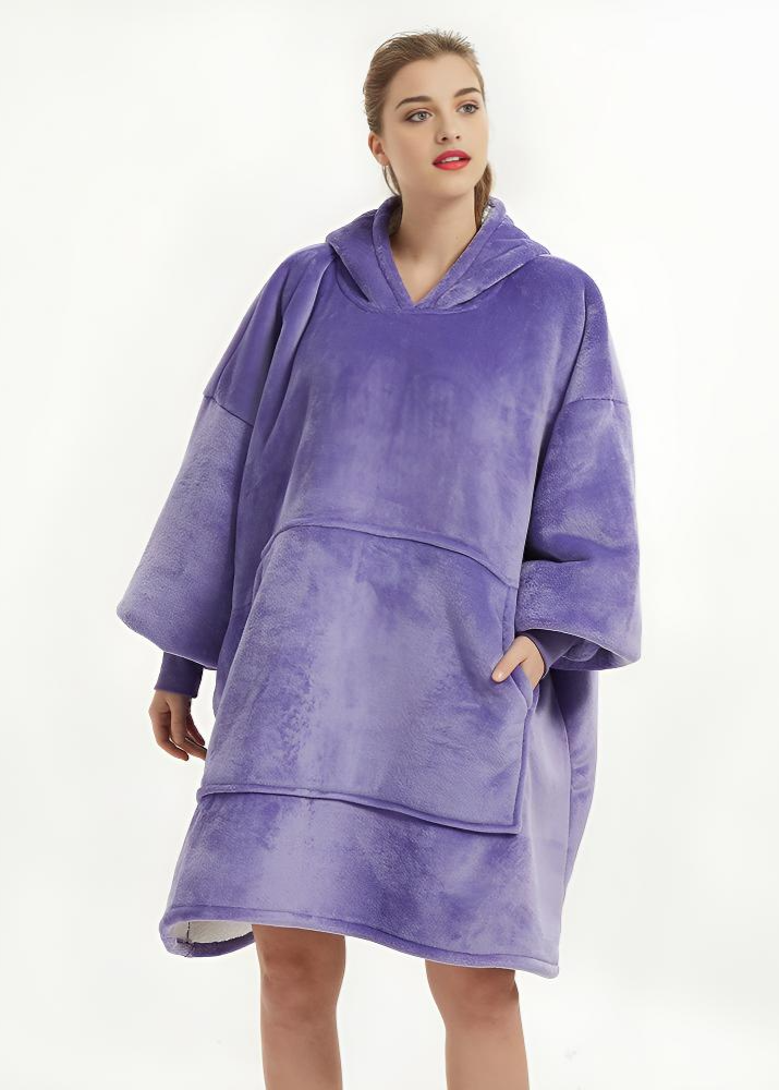 Oversized purple wearable blanket hoodie with roomy fit and soft fleece material.